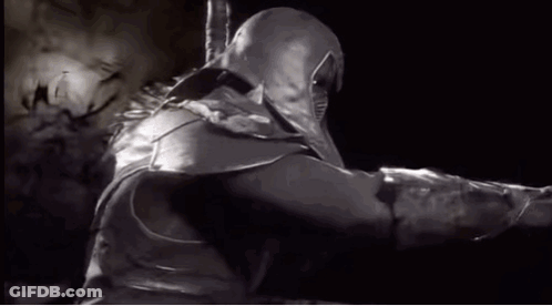 A Black And White Photo Of A Ninja With A Sword . GIF