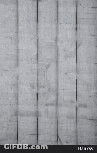 A Black And White Photo Of A Person Falling Into A Shopping Cart With The Words Banksy On The Bottom GIF