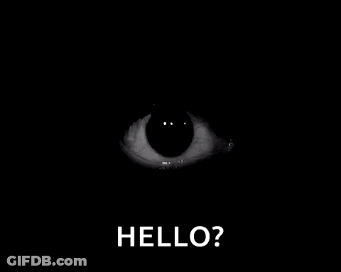 A Black And White Photo Of A Person 'S Eye With The Words `` Hello '' Written In White . GIF