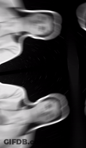 A Black And White Photo Of A Person 'S Foot GIF