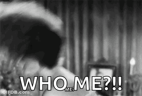 A Black And White Photo Of A Person Saying Who Me ? GIF