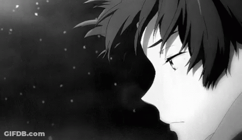 A Black And White Photo Of A Sad Anime Boy With His Eyes Closed In The Snow . GIF