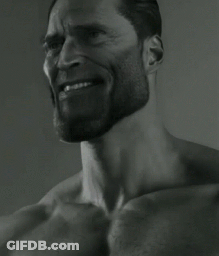 A Black And White Photo Of A Shirtless Man With A Beard GIF