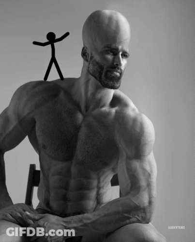 A Black And White Photo Of A Shirtless Man With A Stick Figure On His Head GIF
