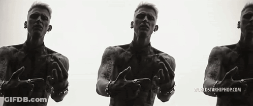A Black And White Photo Of A Shirtless Man With A Worldstarhiphop.com Logo GIF