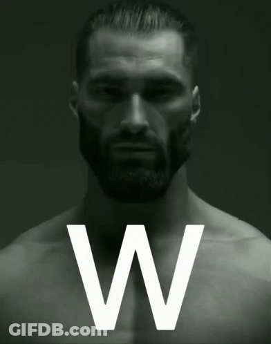 A Black And White Photo Of A Shirtless Man With The Letter W In The Corner GIF