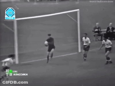 A Black And White Photo Of A Soccer Game From The Year 1990 GIF
