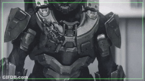 A Black And White Photo Of A Soldier With A Green Border Around It GIF