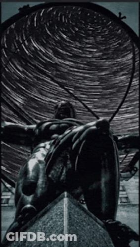 Black And White Statue Photo With Starry Sky GIF