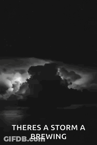 A Black And White Photo Of A Storm With The Words " Theres A Storm A Brewing " Below It GIF