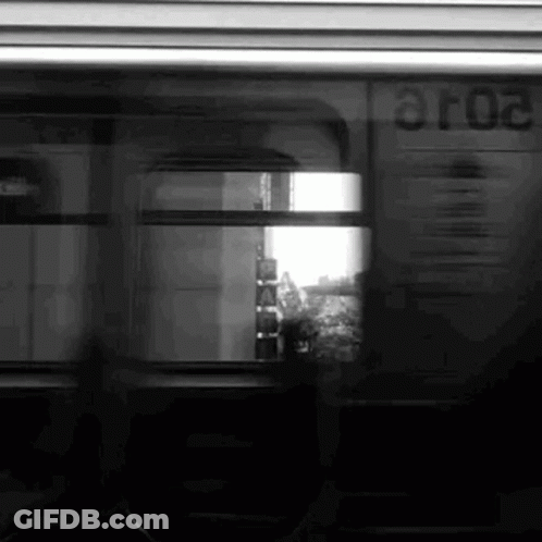 A Black And White Photo Of A Train With The Number Aro2 On The Side GIF