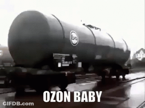 A Black And White Photo Of A Train With The Words `` Ozon Baby '' On It . GIF