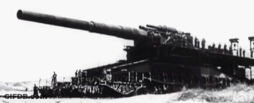 A Black And White Photo Of A Very Large Tank GIF
