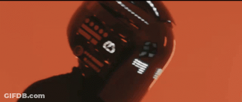 A Black And White Photo Of A White Object In The Dark GIF