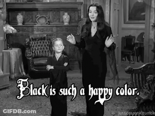 A Black And White Photo Of A Woman And A Boy Standing In A Living Room . GIF