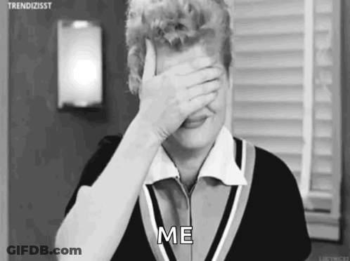 A Black And White Photo Of A Woman Covering Her Face With Her Hand And The Words `` Me '' . GIF