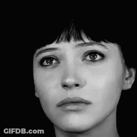 A Black And White Photo Of A Woman Crying With Tears Coming Out Of Her Eyes . GIF