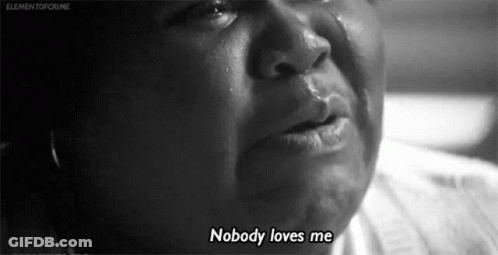 A Black And White Photo Of A Woman Crying With The Words `` Nobody Loves Me '' Written On The Bottom . GIF