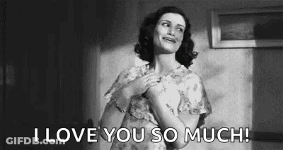 A Black And White Photo Of A Woman Holding Her Chest And Saying `` I Love You So Much ! '' GIF