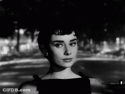Black And White Photo Of Woman In Black Dress GIF