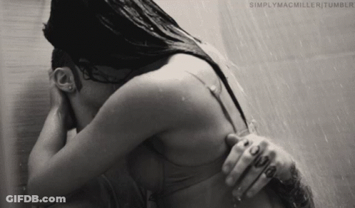 A Black And White Photo Of A Woman In A Shower With Simplymacmiller Tumblr Written On The Bottom Right GIF