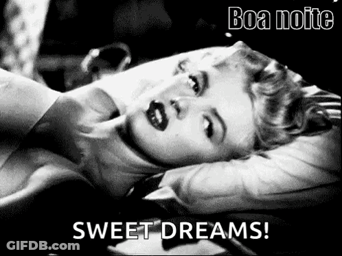 A Black And White Photo Of A Woman Laying On A Bed With The Words `` Sweet Dreams '' Written On The Bottom . GIF
