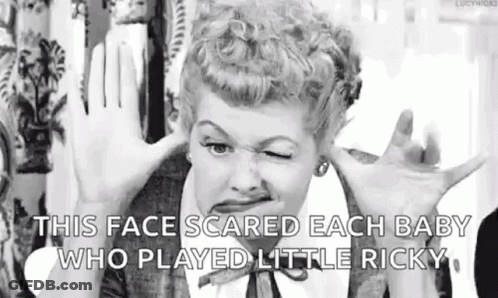 A Black And White Photo Of A Woman Making A Face . GIF