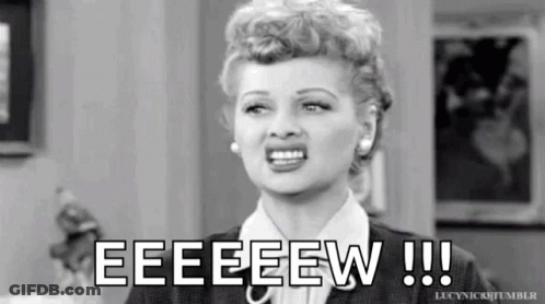 A Black And White Photo Of A Woman Making A Funny Face And The Words Eeeeew !!! GIF