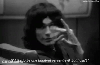 A Black And White Photo Of A Woman Making A Hand Gesture And A Quote . GIF