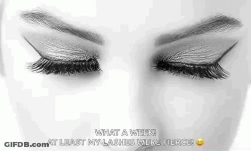 A Black And White Photo Of A Woman 'S Eyes With Long Eyelashes And A Quote . GIF