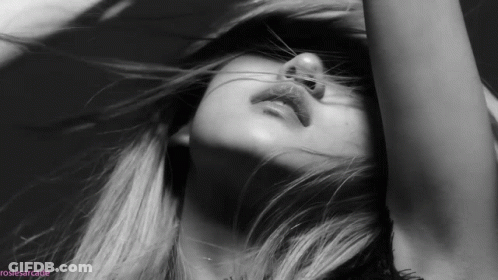 A Black And White Photo Of A Woman 'S Face With The Hashtag Rosiesarcade GIF