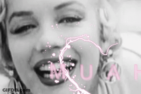 A Black And White Photo Of A Woman 'S Face With The Word Muse Written In Pink GIF