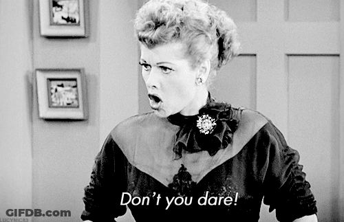 A Black And White Photo Of A Woman Saying Don 'T You Dare GIF