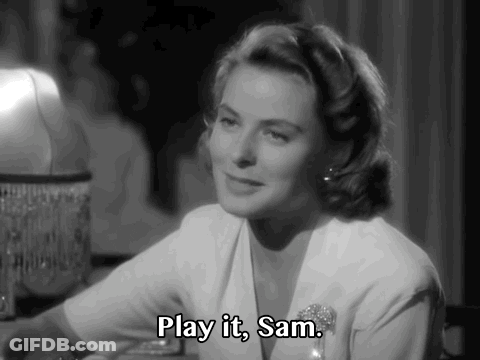 A Black And White Photo Of A Woman Saying " Play It, Sam " GIF