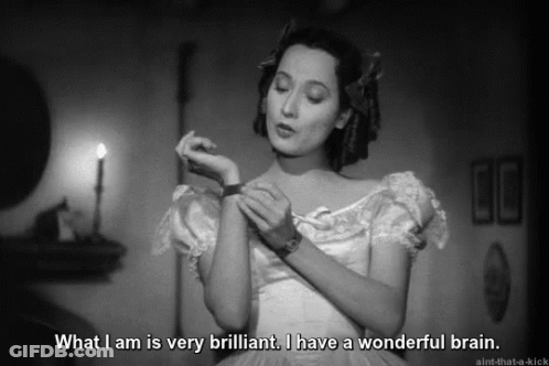 A Black And White Photo Of A Woman Saying What I Am Is Very Brilliant I Have A Wonderful Brain . GIF