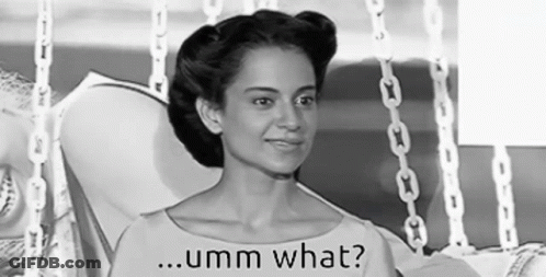 A Black And White Photo Of A Woman Sitting In A Chair With The Words Umm What Written On The Bottom . GIF