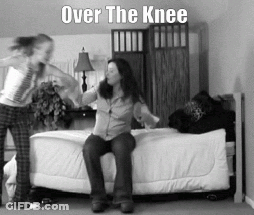 A Black And White Photo Of A Woman Sitting On A Bed With The Words Over The Knee Above Her GIF