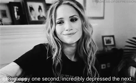 A Black And White Photo Of A Woman Smiling And Saying `` So Happy One Second , Incredibly Depressed The Next . '' GIF