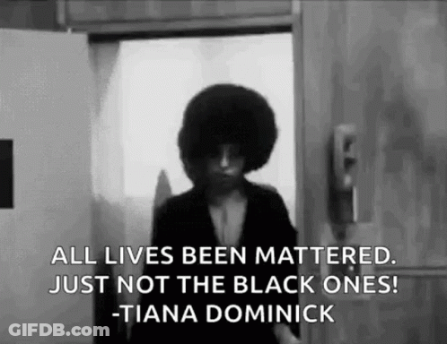A Black And White Photo Of A Woman Standing In Front Of A Door With A Quote . GIF