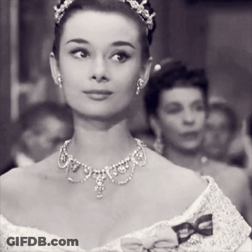 Black And White Woman With Necklace And Tiara GIF