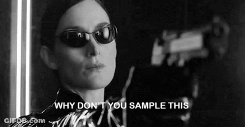 A Black And White Photo Of A Woman Wearing Sunglasses And Saying `` Why Don T You Sample This '' . GIF