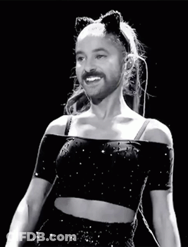 A Black And White Photo Of A Woman With A Fake Beard And Cat Ears . GIF