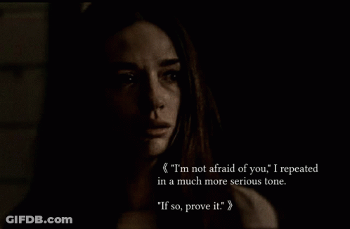 Black And White Photo Woman Saying I'm Not Afraid Of You GIF