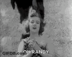 A Black And White Photo Of A Woman With Her Eyes Closed And The Words `` Oh Randy '' Written On It . GIF