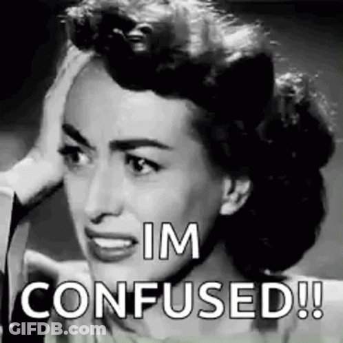 A Black And White Photo Of A Woman With Her Hand On Her Head And The Words `` Im Confused ! '' GIF