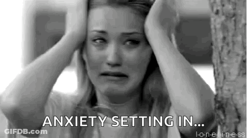 A Black And White Photo Of A Woman With Her Hands On Her Head And The Words `` Anxiety Setting In ... '' . GIF