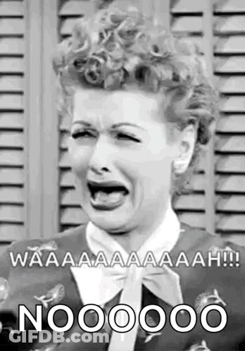 A Black And White Photo Of A Woman With Her Mouth Open . GIF