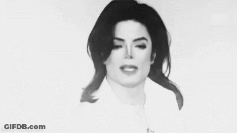 A Black And White Photo Of A Woman With Smooth Jackson Written Below Her GIF