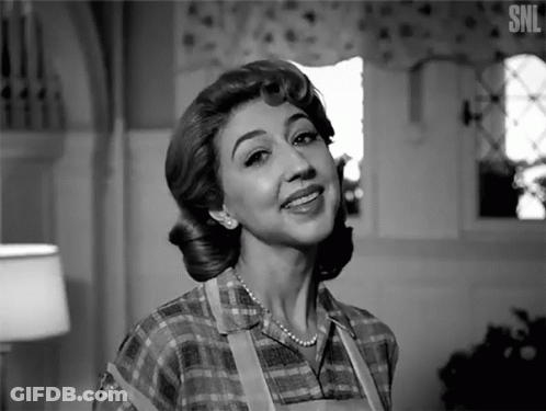 A Black And White Photo Of A Woman With The Letters Snl On The Bottom Right GIF