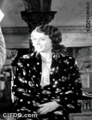 A Black And White Photo Of A Woman With The Number 024 On The Bottom Left GIF